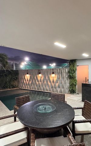 Casa de condomínio à venda com 450m², 4 quartos e 3 vagas Casa de condomínio à venda com 450m², 4 quartos e 3 vagasÁrea externa