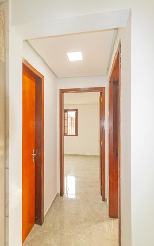Casa à venda com 90m², 2 quartos e 2 vagas Casa à venda com 90m², 2 quartos e 2 vagasCorredor