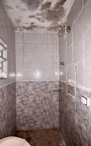 Casa à venda com 400m², 3 quartos e sem vaga Casa à venda com 400m², 3 quartos e sem vagaCasa 2 - Banheiro da Suíte
