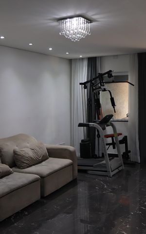 Casa à venda com 295m², 4 quartos e 7 vagasSala 