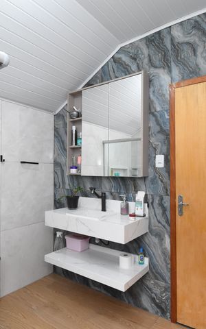 Casa à venda com 156m², 3 quartos e 4 vagasBanheiro da Suíte