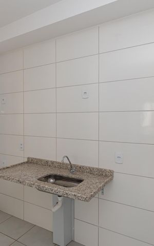 Apartamento para alugar com 52m², 2 quartos e 1 vaga Apartamento para alugar com 52m², 2 quartos e 1 vagaCozinha e Área de Serviço