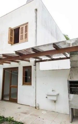 Casa à venda com 79m², 2 quartos e 2 vagas Casa à venda com 79m², 2 quartos e 2 vagasÁrea externa
