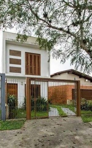 Casa à venda com 79m², 2 quartos e 2 vagas Casa à venda com 79m², 2 quartos e 2 vagasFachada