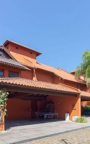 Casa de condomínio para alugar com 487m², 4 quartos e 3 vagas