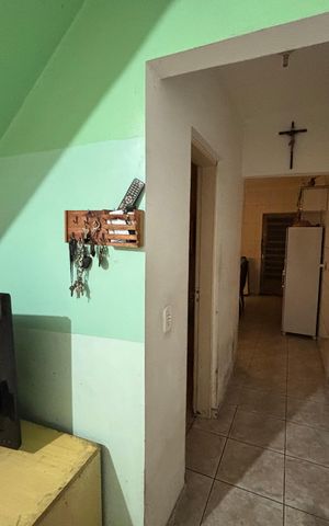Casa à venda com 250m², 4 quartos e 2 vagas Casa à venda com 250m², 4 quartos e 2 vagasCorredor