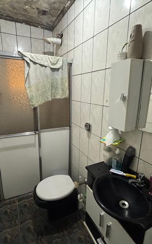 Casa à venda com 250m², 4 quartos e 2 vagas Casa à venda com 250m², 4 quartos e 2 vagasBanheiro 2