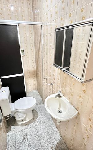 Casa à venda com 125m², 5 quartos e 2 vagas Casa à venda com 125m², 5 quartos e 2 vagasBanheiro de serviço