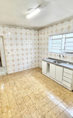 Casa à venda com 125m², 5 quartos e 2 vagas Casa à venda com 125m², 5 quartos e 2 vagasCozinha