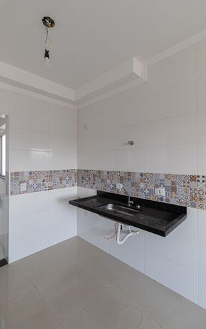 Casa à venda com 40m², 2 quartos e sem vaga Casa à venda com 40m², 2 quartos e sem vagaSala e Cozinha