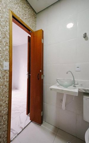 Casa à venda com 80m², 3 quartos e 1 vaga Casa à venda com 80m², 3 quartos e 1 vagaBanheiro da Suíte