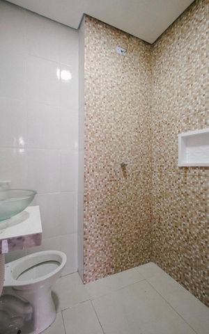 Casa à venda com 80m², 3 quartos e 1 vaga Casa à venda com 80m², 3 quartos e 1 vagaBanheiro da Suíte