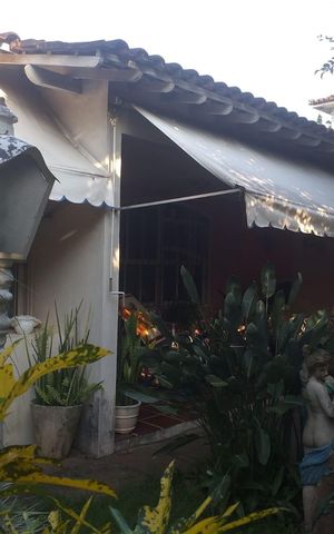 Casa à venda com 360m², 4 quartos e 4 vagas Casa à venda com 360m², 4 quartos e 4 vagasÁrea externa