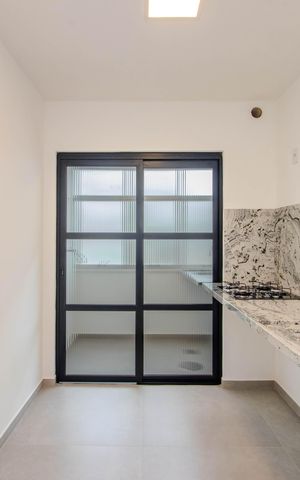 Apartamento à venda com 66m², 2 quartos e 1 vaga Apartamento à venda com 66m², 2 quartos e 1 vagaCozinha e Área de Serviço