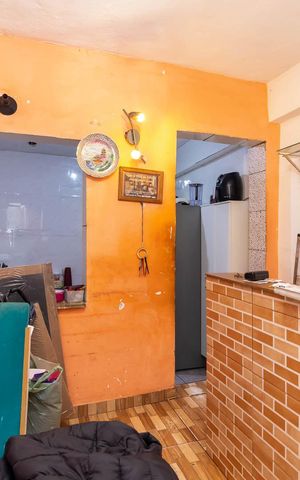 Casa à venda com 70m², 2 quartos e 1 vagaSalão / Garagem