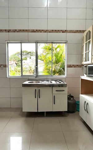 Casa de condomínio para alugar com 149m², 2 quartos e 3 vagasCozinha 
