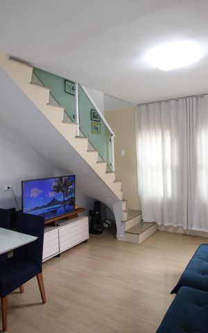 Casa de condomínio à venda com 67m², 2 quartos e 1 vagaSala