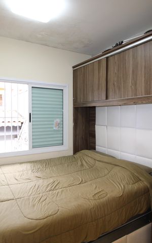 Casa de condomínio à venda com 67m², 2 quartos e 1 vagaQuarto 1