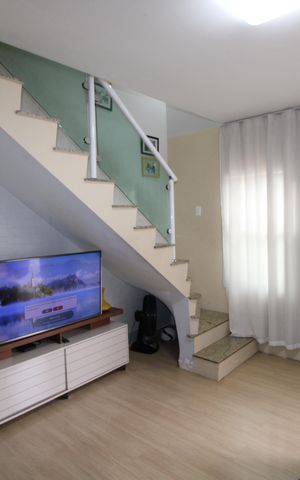 Casa de condomínio à venda com 67m², 2 quartos e 1 vagaSala