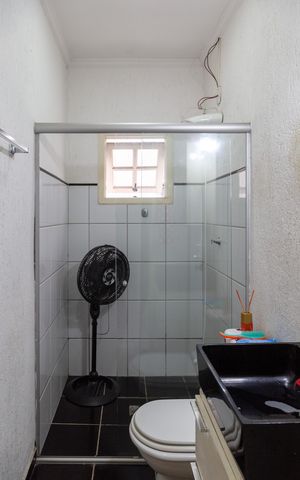 Casa à venda com 249m², 3 quartos e 4 vagasBanheiro do Quarto 1 suíte
