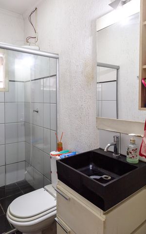 Casa à venda com 249m², 3 quartos e 4 vagasBanheiro do Quarto 1 suíte