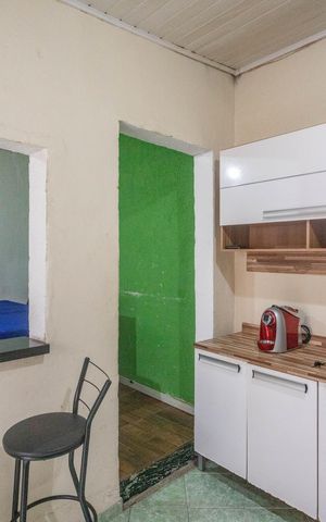 Casa à venda com 150m², 2 quartos e 2 vagas Casa à venda com 150m², 2 quartos e 2 vagasCozinha