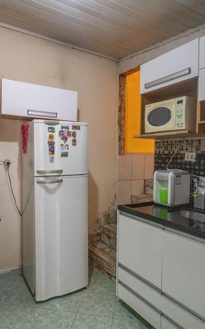 Casa à venda com 150m², 2 quartos e 2 vagas Casa à venda com 150m², 2 quartos e 2 vagasCozinha