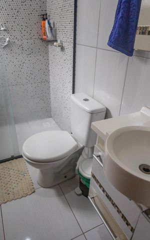 Casa à venda com 150m², 2 quartos e 2 vagas Casa à venda com 150m², 2 quartos e 2 vagasBanheiro da suíte 1