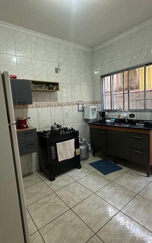 Casa à venda com 140m², 3 quartos e 2 vagas Casa à venda com 140m², 3 quartos e 2 vagasCozinha