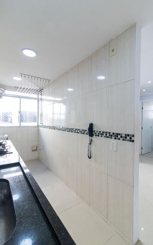 Apartamento à venda com 48m², 2 quartos e 1 vaga Apartamento à venda com 48m², 2 quartos e 1 vagaCozinha e Área de Serviço
