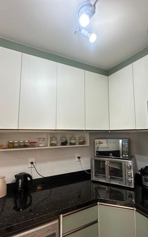 Casa de condomínio à venda com 57m², 2 quartos e 2 vagasCozinha
