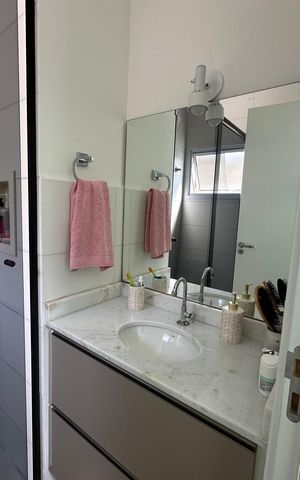 Casa de condomínio à venda com 57m², 2 quartos e 2 vagasBanheiro da Suíte 1