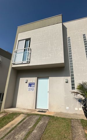 Casa de condomínio à venda com 57m², 2 quartos e 2 vagasFachada