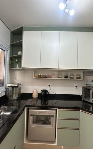 Casa de condomínio à venda com 57m², 2 quartos e 2 vagasCozinha