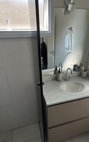 Casa de condomínio à venda com 57m², 2 quartos e 2 vagasBanheiro da Suíte 2