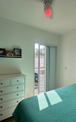 Casa de condomínio à venda com 57m², 2 quartos e 2 vagasSuíte 1