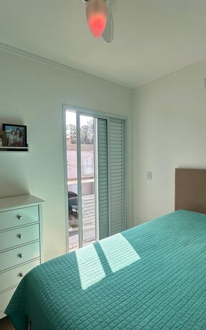 Casa de condomínio à venda com 57m², 2 quartos e 2 vagasSuíte 1