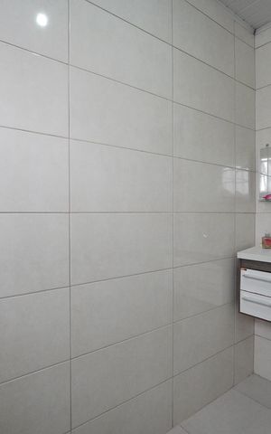 Casa à venda com 128m², 3 quartos e 2 vagasBanheiro