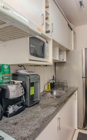 Apartamento para alugar com 48m², 2 quartos e 1 vaga Apartamento para alugar com 48m², 2 quartos e 1 vagaCozinha e Área de Serviço