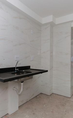 Apartamento à venda com 36m², 2 quartos e sem vaga Apartamento à venda com 36m², 2 quartos e sem vagaCozinha e área de serviço