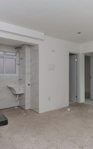 Apartamento à venda com 36m², 2 quartos e sem vaga Apartamento à venda com 36m², 2 quartos e sem vagaCozinha e área de serviço