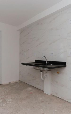Apartamento à venda com 36m², 2 quartos e sem vaga Apartamento à venda com 36m², 2 quartos e sem vagaCozinha e área de serviço