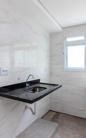 Apartamento à venda com 34m², 2 quartos e sem vaga Apartamento à venda com 34m², 2 quartos e sem vagaCozinha e Área de Serviço