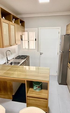 Casa à venda com 82m², 3 quartos e 3 vagas Casa à venda com 82m², 3 quartos e 3 vagasCozinha