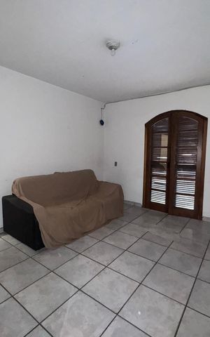 Casa à venda com 80m², 2 quartos e 2 vagasSala