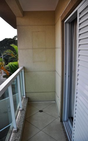 Casa à venda com 210m², 4 quartos e 4 vagas Casa à venda com 210m², 4 quartos e 4 vagasDetalhe - Varanda