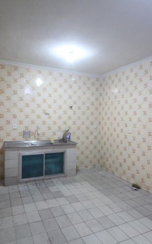 Casa para alugar com 100m², 2 quartos e 2 vagasCozinha