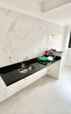 Apartamento à venda com 44m², 2 quartos e 1 vaga Apartamento à venda com 44m², 2 quartos e 1 vagaCozinha e Área de Serviço