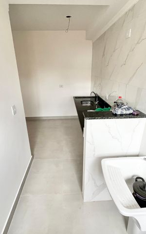 Apartamento à venda com 44m², 2 quartos e 1 vaga Apartamento à venda com 44m², 2 quartos e 1 vagaCozinha e Área de Serviço