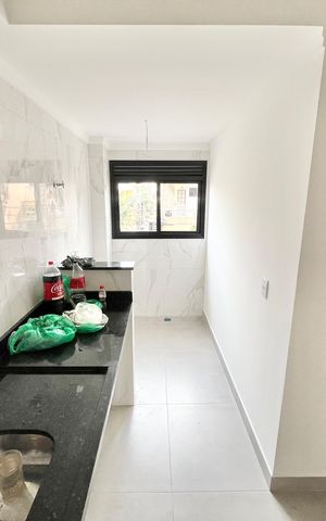 Apartamento à venda com 44m², 2 quartos e 1 vaga Apartamento à venda com 44m², 2 quartos e 1 vagaCozinha e Área de Serviço